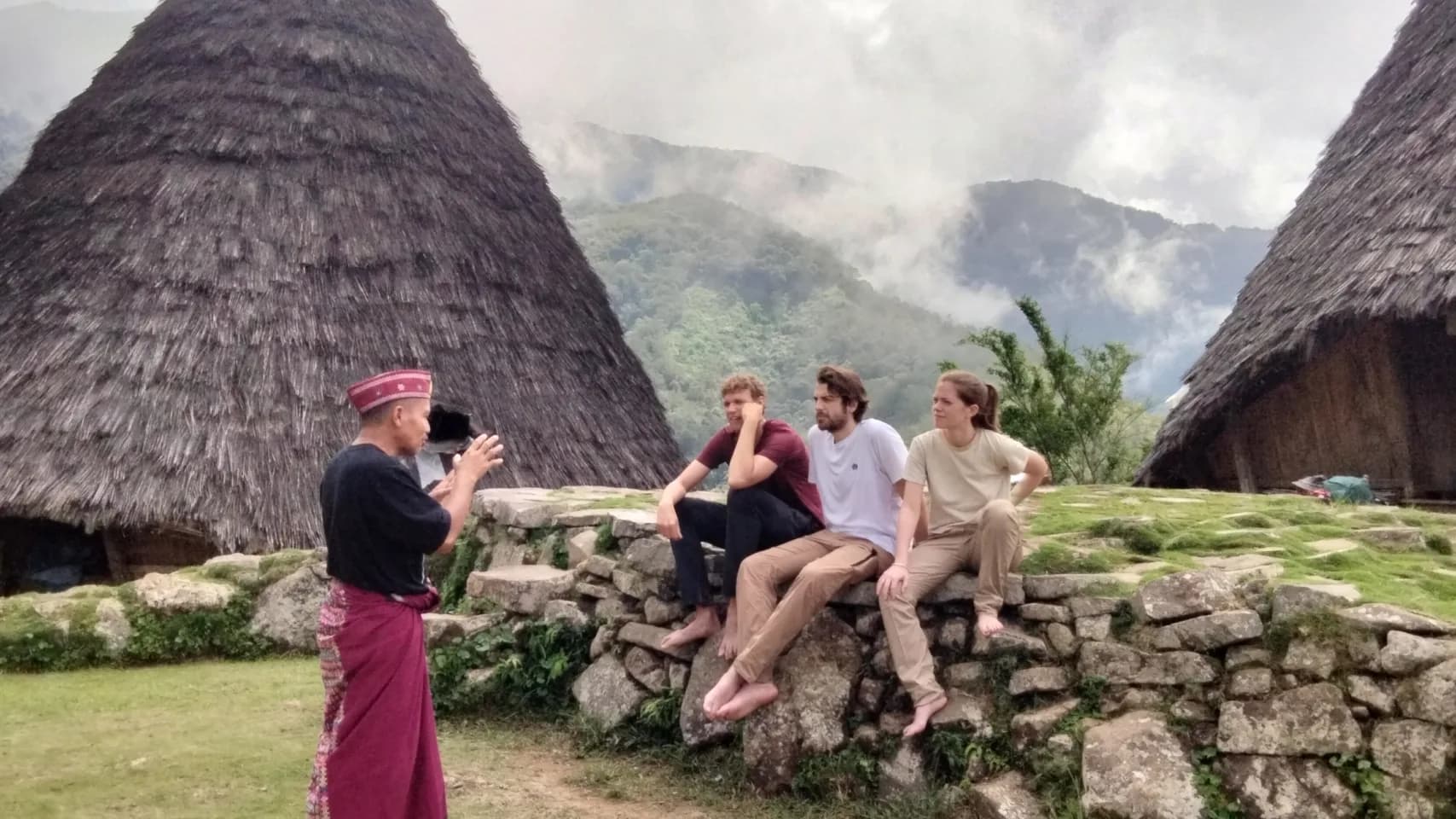 Capturing unforgettable memories against the majestic backdrop of the Mbaru Niang.