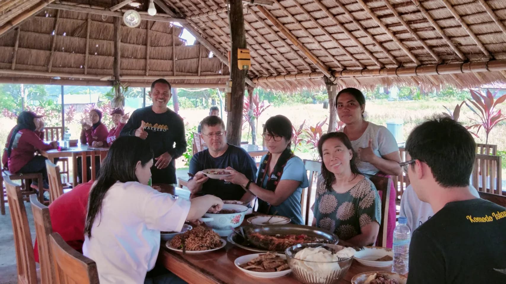Sharing stories and a hearty, home-cooked meal together at the lodge's open-air dining area.