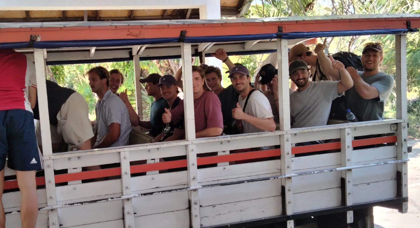 Guests riding local transport to Waerebo Lodge